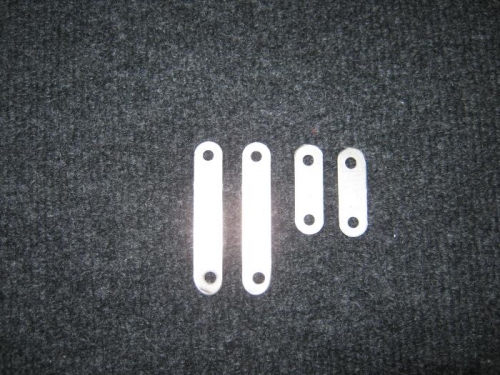 Trimmed the rudder cable links to called out configuration