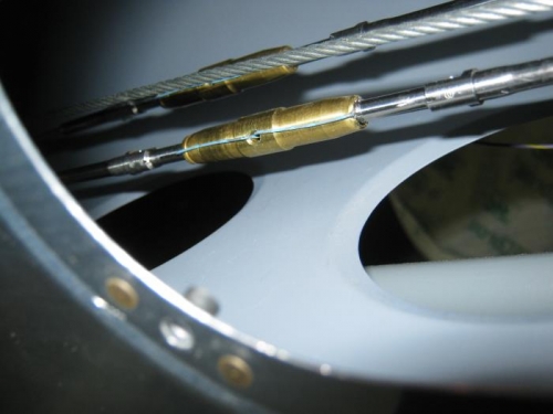 Lower stabilator cable secured and tensioned to 45 inch pounds