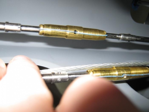 Upper stabilator cable secured and tensioned to 38 inch pounds