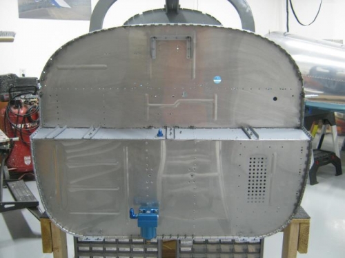 Riveted upper firewall