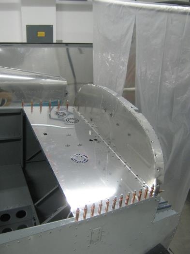 Fitted panel base to upper firewall and aligned with longerons and match drilled longerons