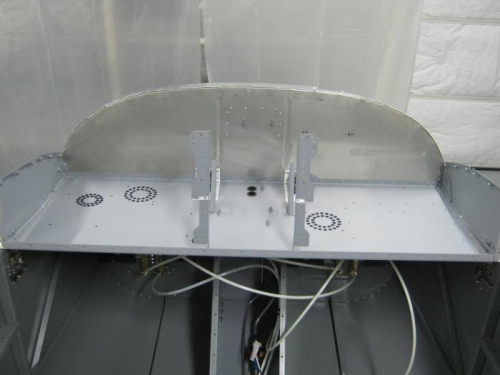Rivet panel base to upper firewall-rear view