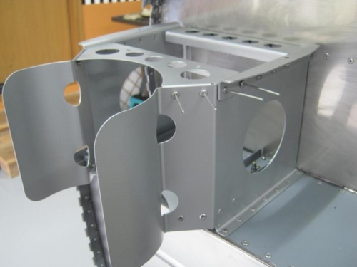 Riveting oil mount brackets