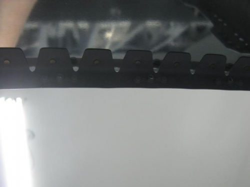 Underside of upper forward fuselage skin attach rivets
