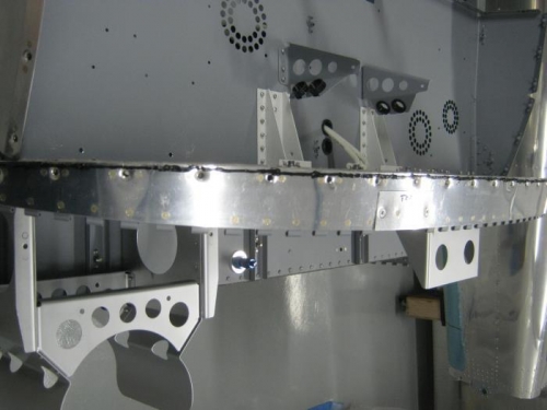 Applied sealant to the F1201H upper forward fuse doubler