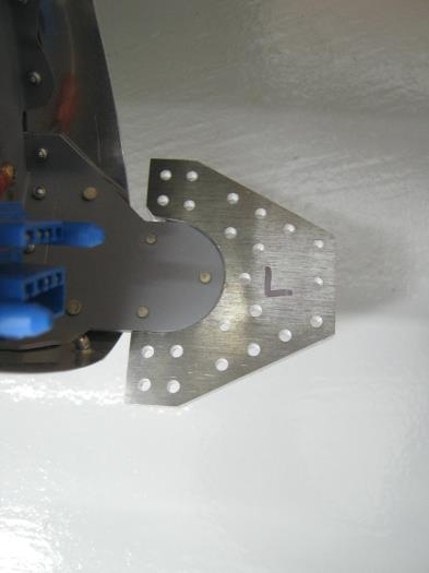 File & fit the F1203C stub spar receptacle to the Left front stub spar