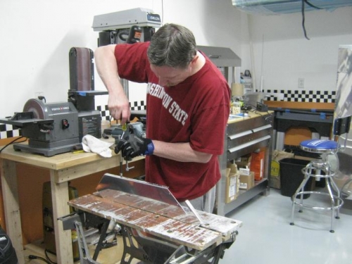 Machine countersinking and installing nut plates on F1217A tunnel rib upper flange