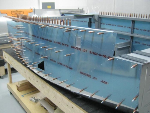 Match drilled the F1234 R canopy deck  and the F1255 R longeron using F1270 right skin