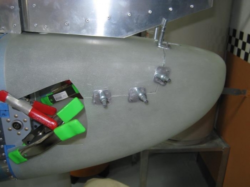 Tailcone temporarily mounted on left side for match drilling for 1294--C nut plates