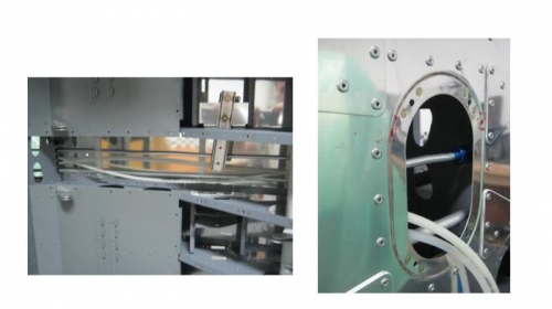 Fuel line return from aft center section & showing connection to fitting at aft bulkhead