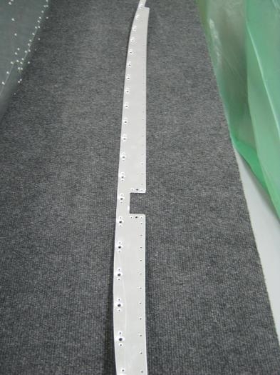 F1201H upper forward fuse doubler completed machine countersinking nut plate holes