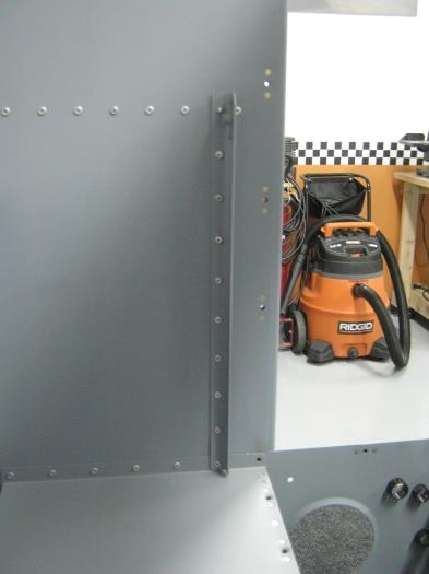 Riveted the F1207J attach angle to the rear baggage bulkhead