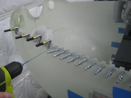 Drilling rivet pattern laid out in 38-04, step 2 into bottom cowl & side hinge