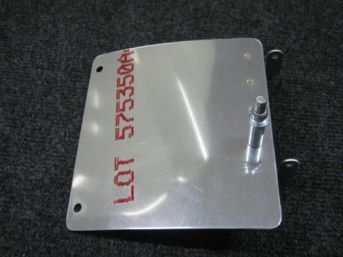 Drilling holes for attachment to oil door hinge