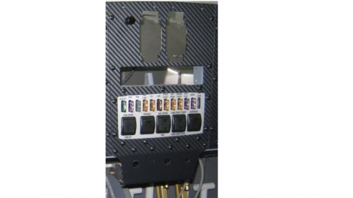 Potentiometer/dimmer knob installed-top left corner of center panel