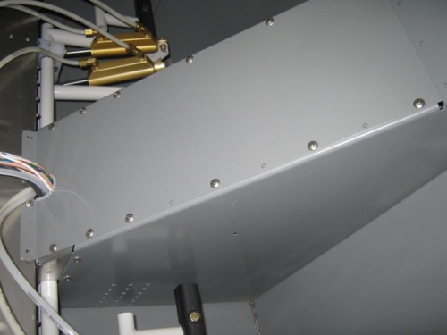 Rudder pedal access cover installed