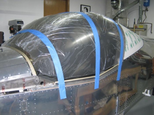 Canopy compressed in position on forward bow.  Note the tangient line along the bow