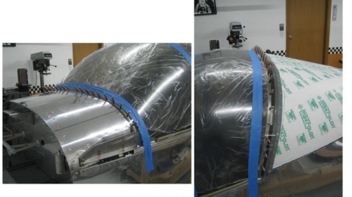 Left side forward and aft canopy attachment holes located and drilled