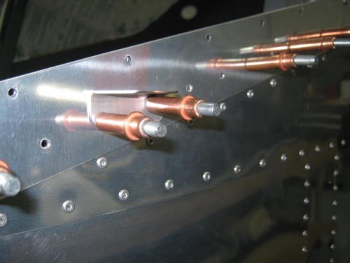 Riveting canopy onto canopy skirts-Left side