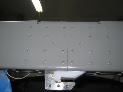 Tapped and installed canopy latch block