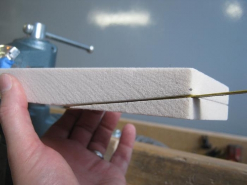 Cut block using band saw