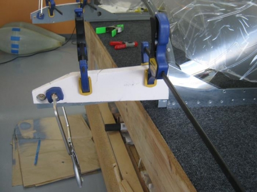 Attached block to forward canopy rail using per directions