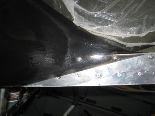 Left side screw holes drilled and reinstalled