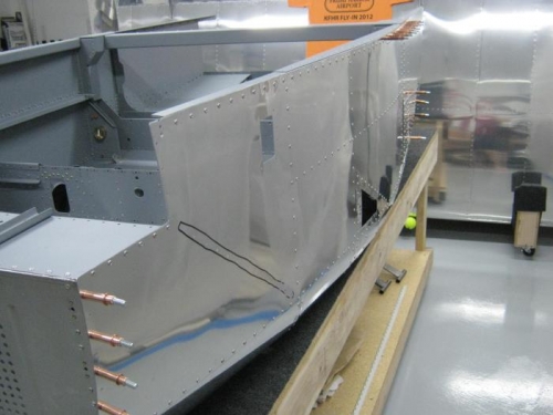 Completed riveting left side skin