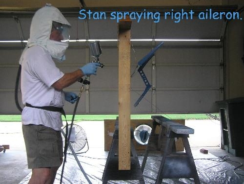 Stan spaying blue on aileron