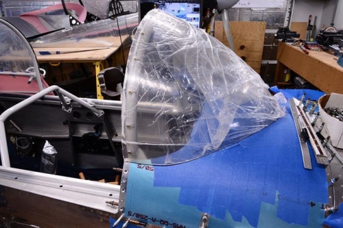 Initial drilling and fitting of windscreen, spacers, and roll bar.