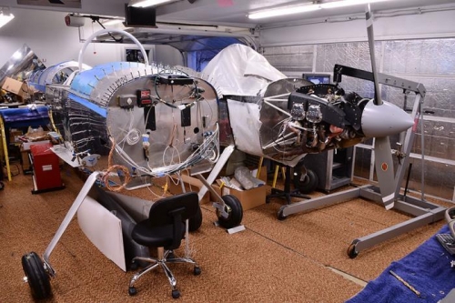 Removing engine from the old fuselage.