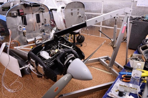 Engine going up on the new fuselage.