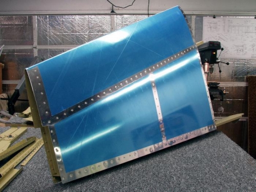 Riveting Vertical Fin