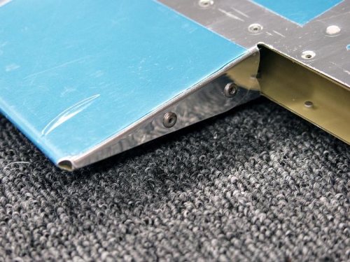 Trim Tab Cutout Bending/Riveting