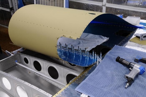 Left Wing - Folding The Skin Back For Bucking Access