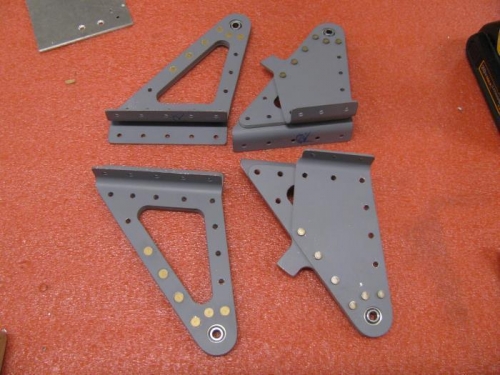 Riveting the aileron hinge parts together