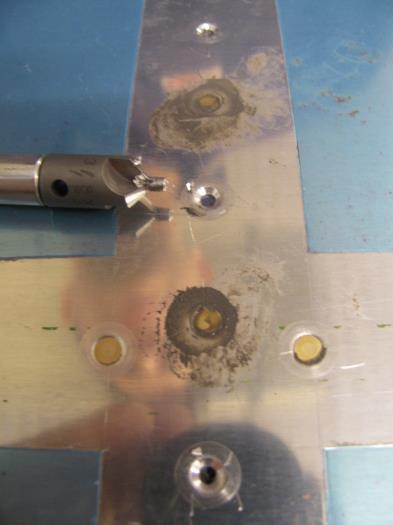 One or two turns of the deburring tool and the hole is perfectly clean