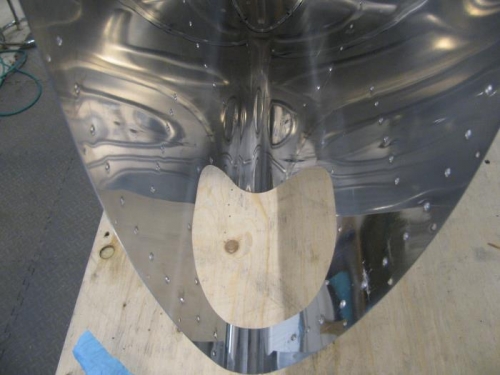 The landing light area received a clear coat prior to riveting