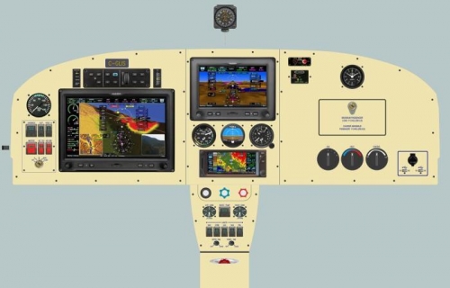 Full glass cockpit - Garmin. Note the backup steam gauges.