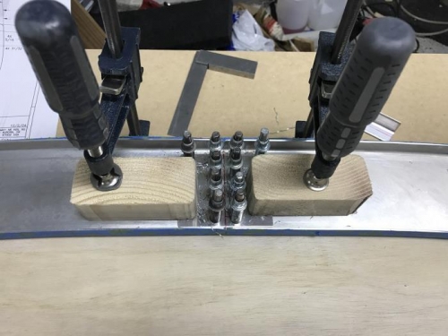 Clamping on the raised plate