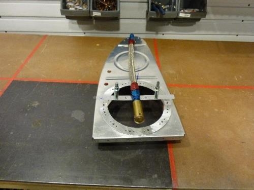 Access panel anti-hang bracket