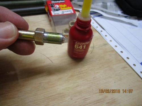 Applying Loctite to male end inserts