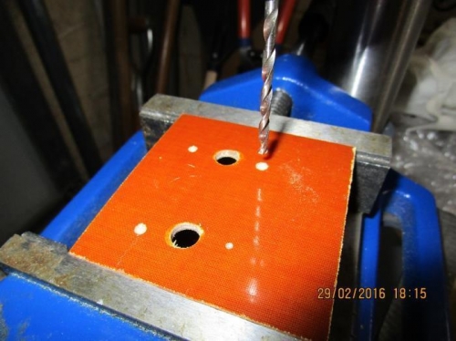 Mstr cyl mount drilling lock nut rivet holes
