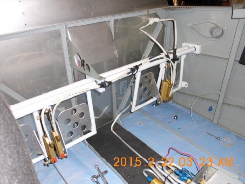 Show routing of tubing forward of pedal assembly