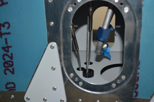 cables routed aft to access hole