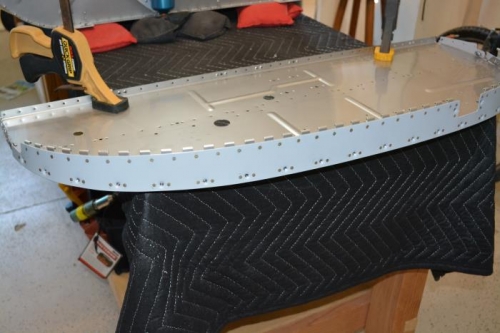 long hinge rivetted in place