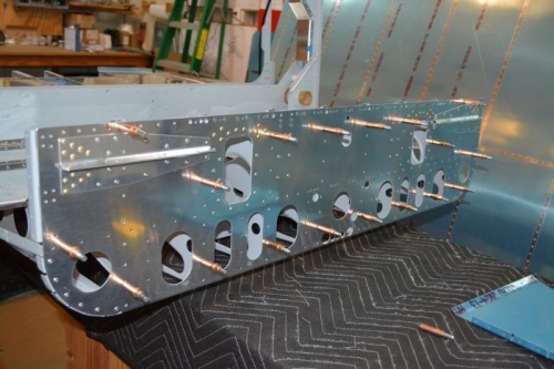 Bulkhead attached to seat ribs