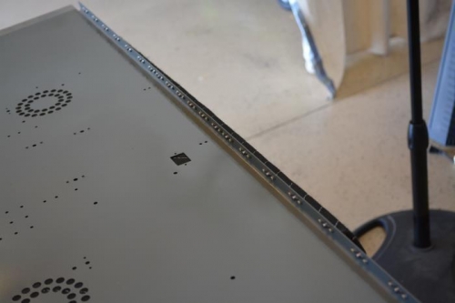 The 20 nut plates attached to panel base