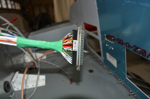 slide heat shink as close as possible to plug