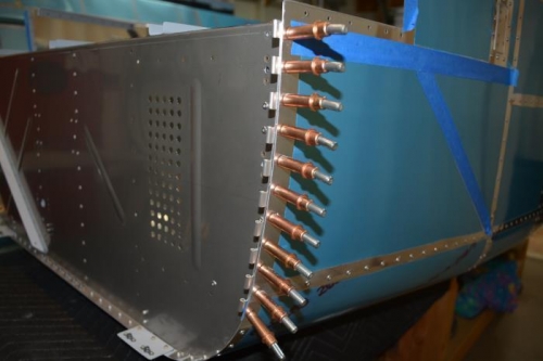 Left lower cowl hinge finally drilled and ready to rivet